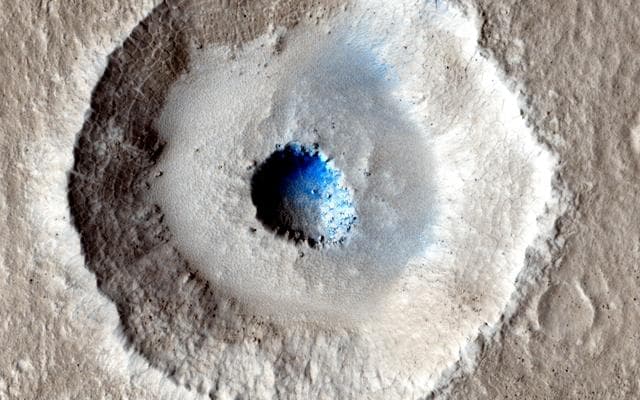 NASA image: Craters in an Icy Surface