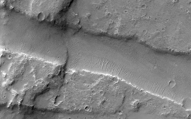 NASA image: Finding Faults in Melas Chasma