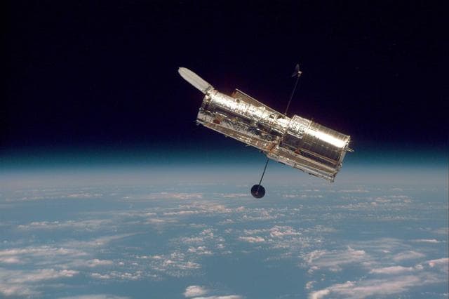 NASA image: Hubble Against Earth Horizon 1997