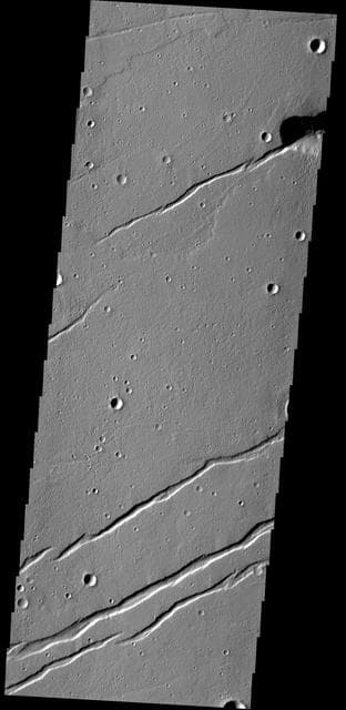 NASA image: Labeatis Fossae
