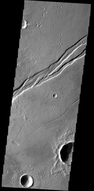 NASA image: Labeatis Fossae