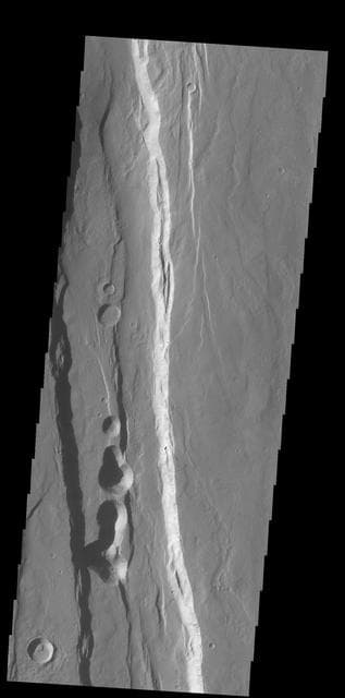 NASA image: Ceraunius Fossae