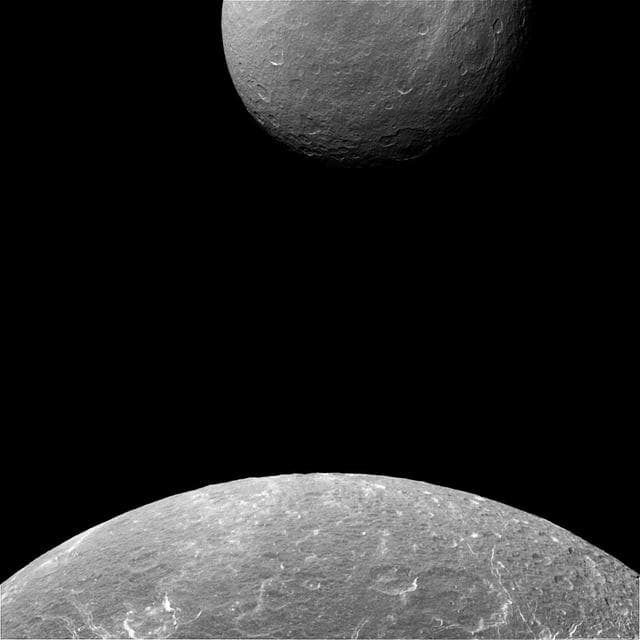NASA image: Dione Dwarfing Rhea