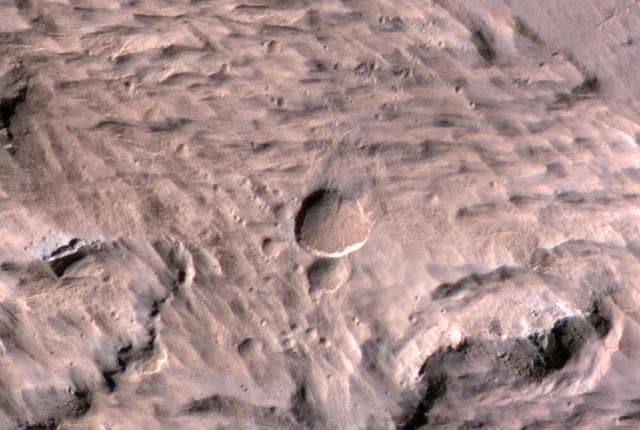 NASA image: Large, Fresh Crater Surrounded by Smaller Craters