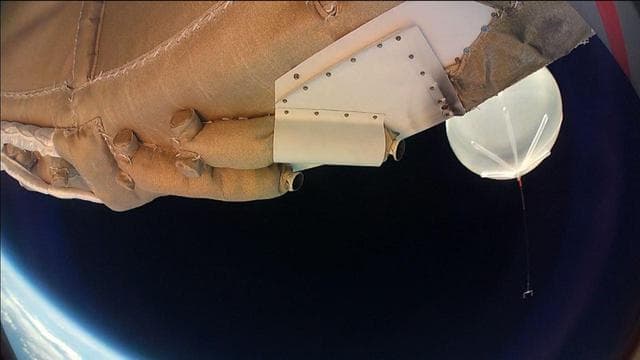 NASA image: Departing Saucer Snaps Balloon