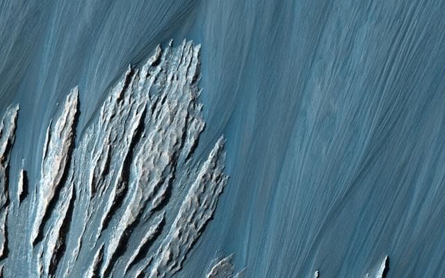NASA image: A Revealing Landslide in Hebes Chasma