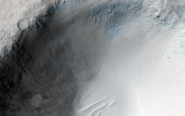 NASA image: An Impact Crater in Isidis Planitia