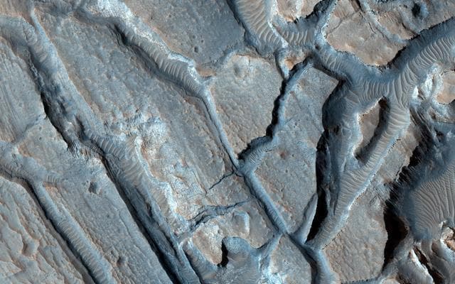 NASA image: Ancient Lake Sediments in a Crater
