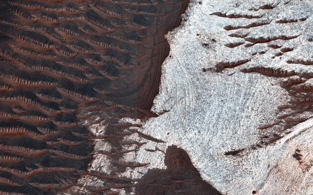 NASA image: Water-Bearing Rocks in Noctis Labyrinthus