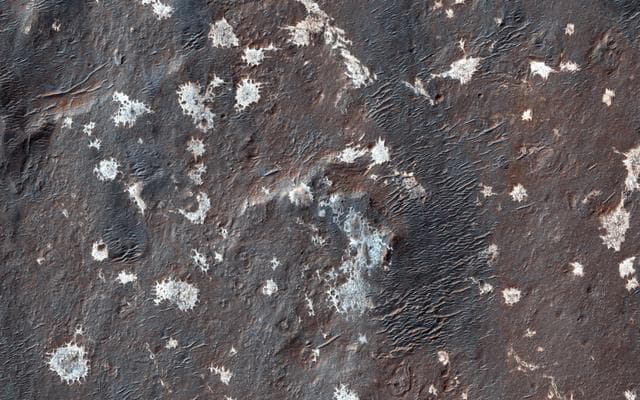 NASA image: Mysterious Light-Toned Deposit in Vinogradov Crater