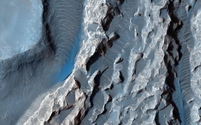 NASA image: A Light Toned Deposit in Arsinoes Chaos