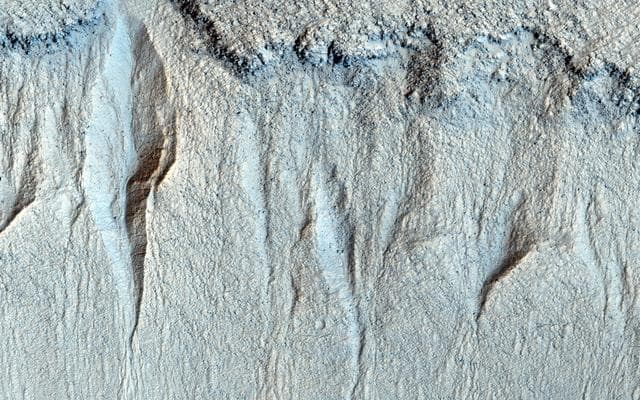 NASA image: Gullies in Liu Hsin Crater