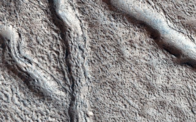 NASA image: Cracks in a Debris Apron