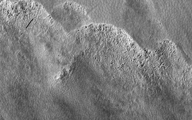 NASA image: Pitted Landforms in Southern Hellas Planitia