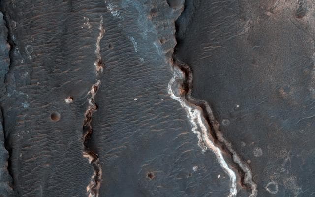 NASA image: Possible Fluvial Features in Golden Crater