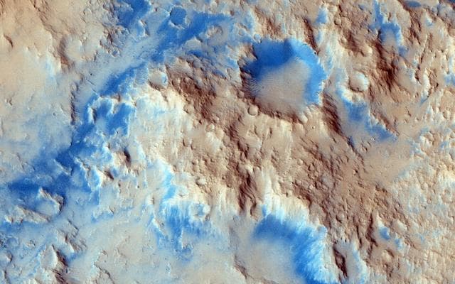 NASA image: Sinuous Ridge Materials in Reuyl Crater