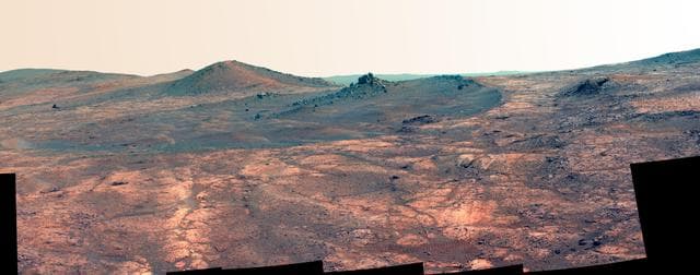 NASA image: Rock Spire in Spirit of St. Louis Crater on Mars False Color