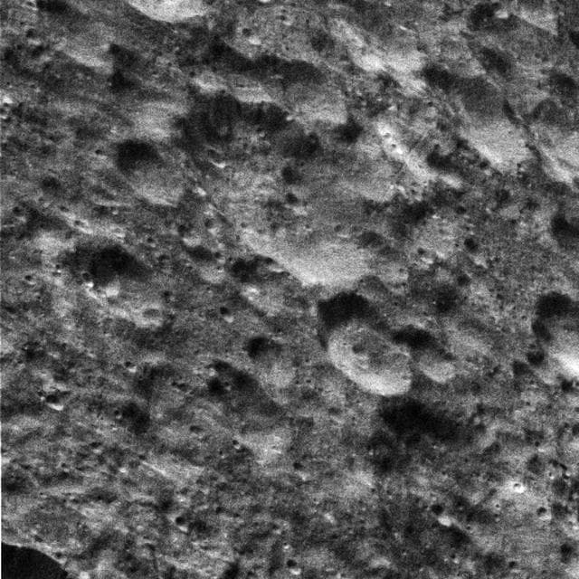 NASA image: Dione Saturn-lit Surface