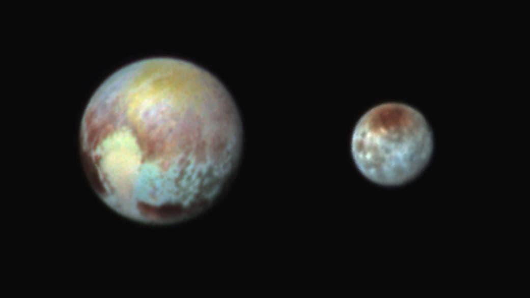 NASA image: Pluto and Charon in False Color Show Compositional Diversity