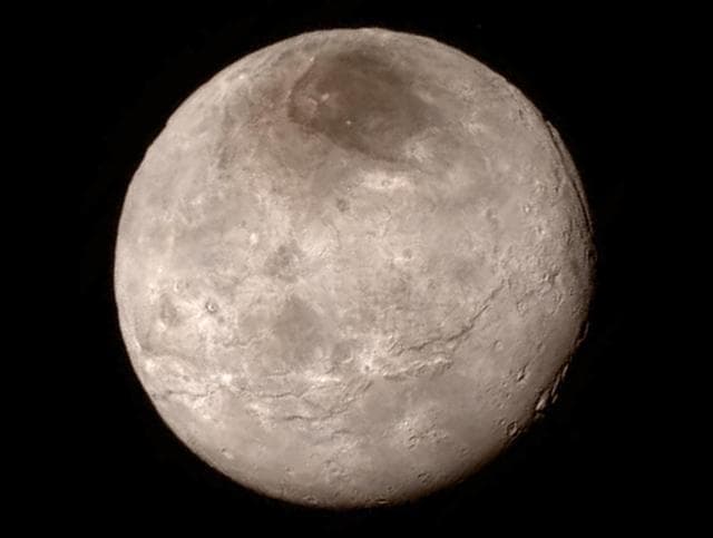 NASA image: Charon Surprising Youthful and Varied Terrain