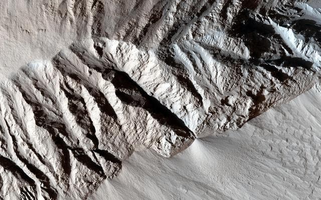 NASA image: Yardang-Sculpted Deposits from Apollonaris Patera