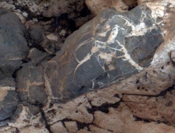 NASA image: Injection of Light Material into an Older Dark Vein