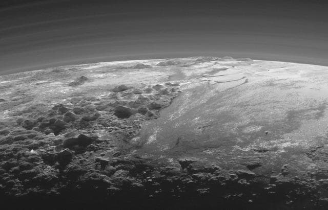 NASA image: Closer Look: Majestic Mountains and Frozen Plains