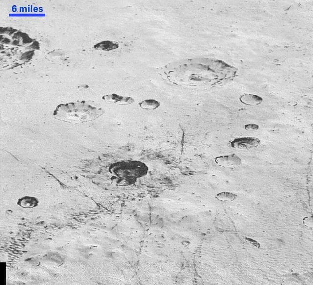 NASA image: Layered Craters and Icy Plains