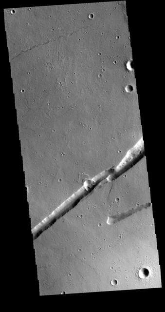 NASA image: Labeatis Fossae
