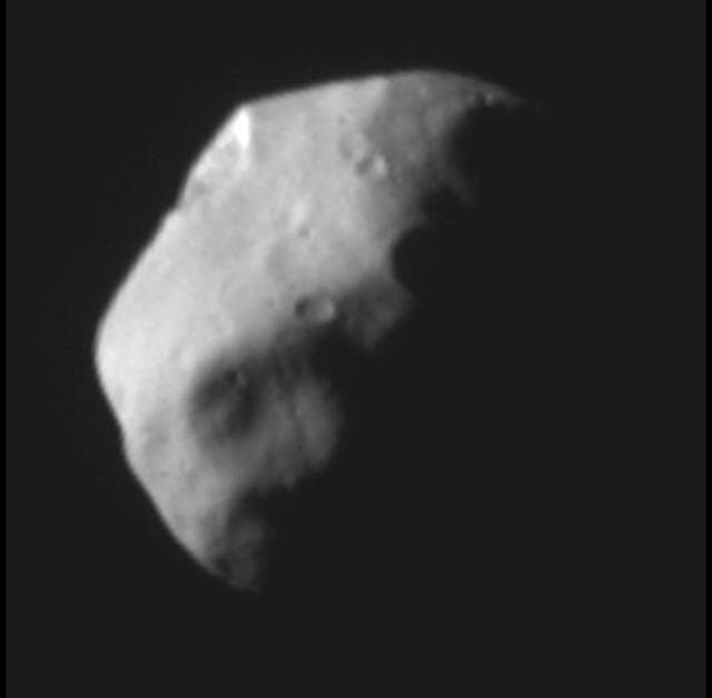 NASA image: Pluto Moon Nix, Half Illuminated