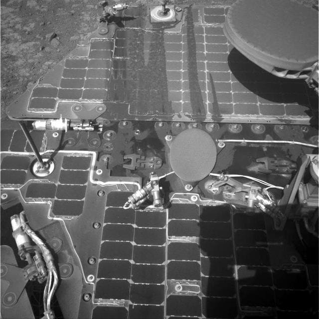 NASA image: Streaks on Opportunity Solar Panel After Uphill Drive