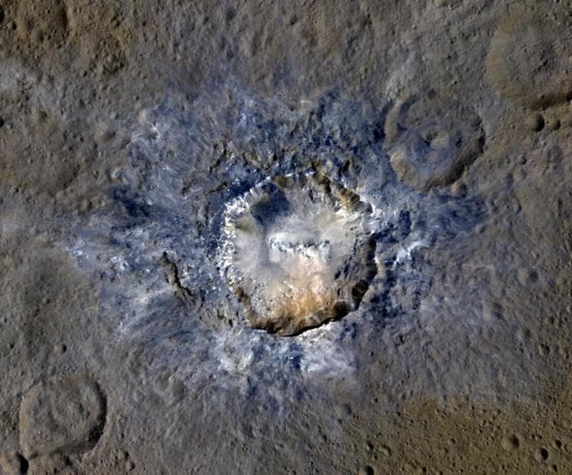 NASA image: Haulani Crater in Enhanced Color