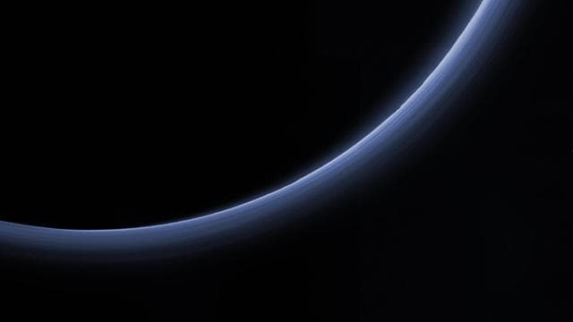NASA image: Pluto Haze in Bands of Blue