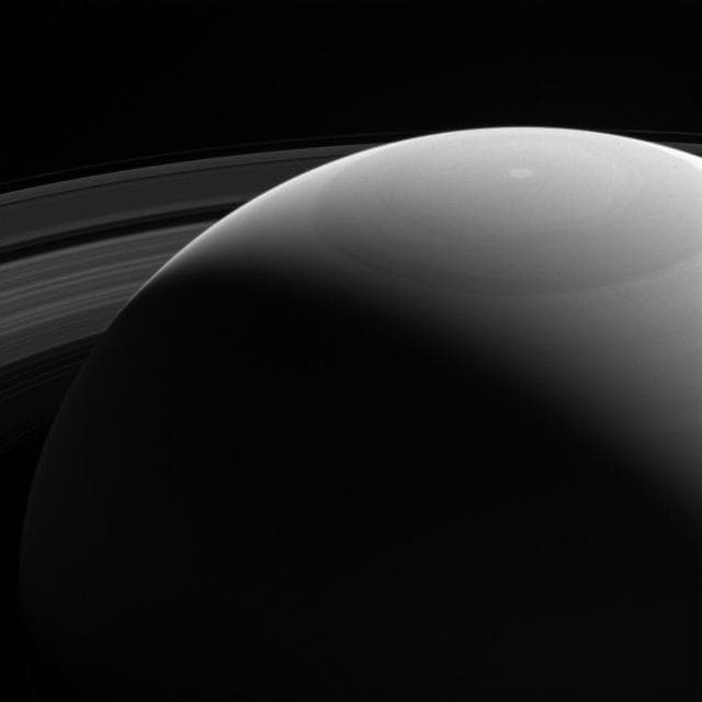 NASA image: Peeking over Saturn Shoulder