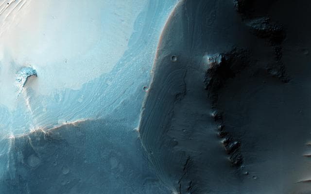 NASA image: Faulted Layers in Collapse Pits