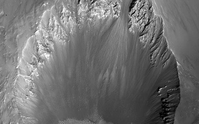 NASA image: On the Shape of Impact Craters