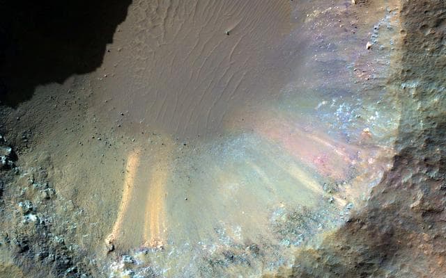 NASA image: A One-Kilometer Crater on the Floor of Saheki Crater