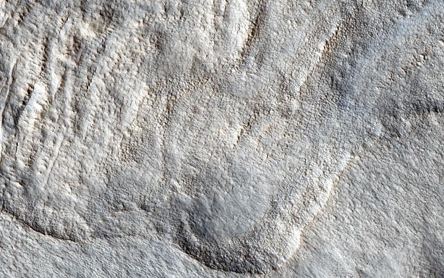 NASA image: What Lies Beneath: Surface Patterns of Glacier-Like Landforms