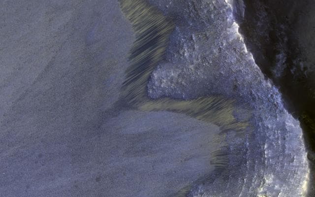 NASA image: Seasonal Flows on Warm Slopes