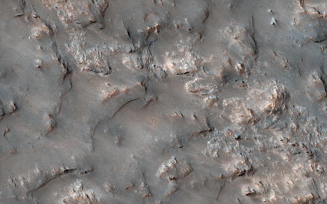 NASA image: Exposed Bedrock in the Koval'sky Impact Basin