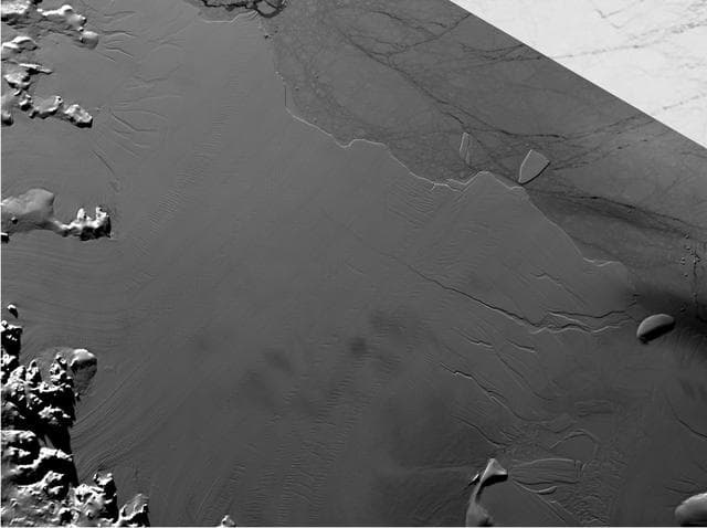 Spawning of Massive Antarctic Iceberg Captured by NASA