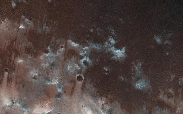 NASA image: Exploring the Sandy Province of Herschel Crater