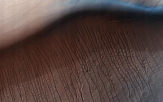 NASA image: Squiggles in Hellas Planitia