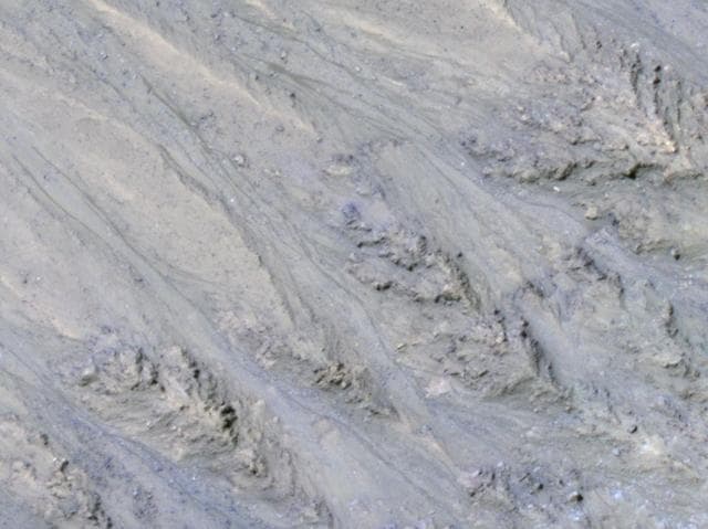 NASA image: Seasonal Dark Streaks in Tivat Crater, Mars