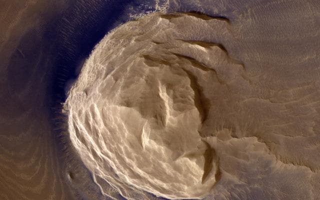 NASA image: Dark Materials on Olympus Mons