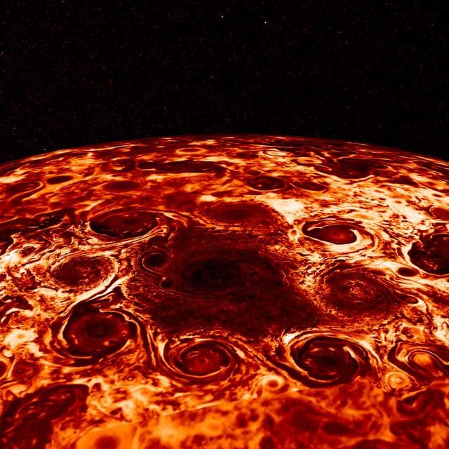 NASA image: Cyclones Encircle Jupiter's North Pole