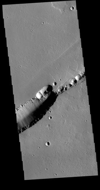 NASA image: Labeatis Fossae
