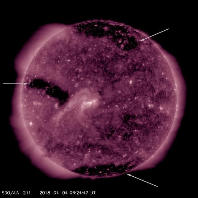 NASA image: Three Coronal Holes