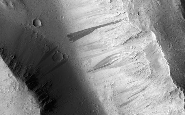 NASA image: The Dark Side of Dust Avalanches