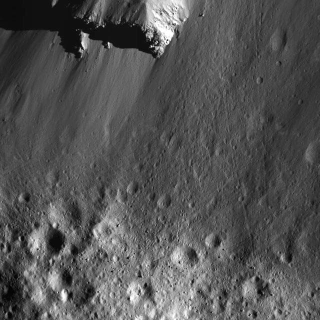NASA image: Boulders Along Urvara Crater's Wall